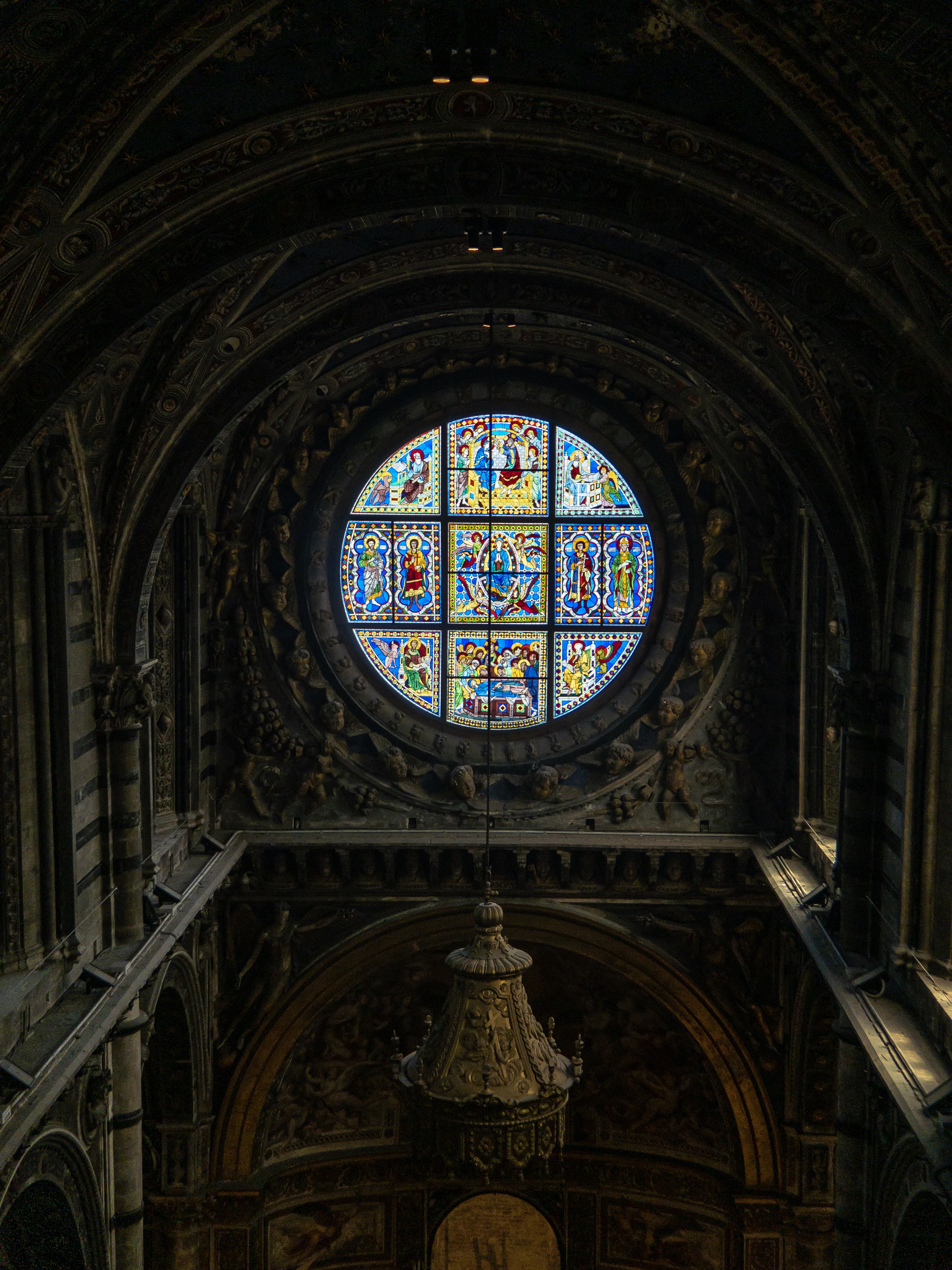 One of the rose windows from high in the rafters