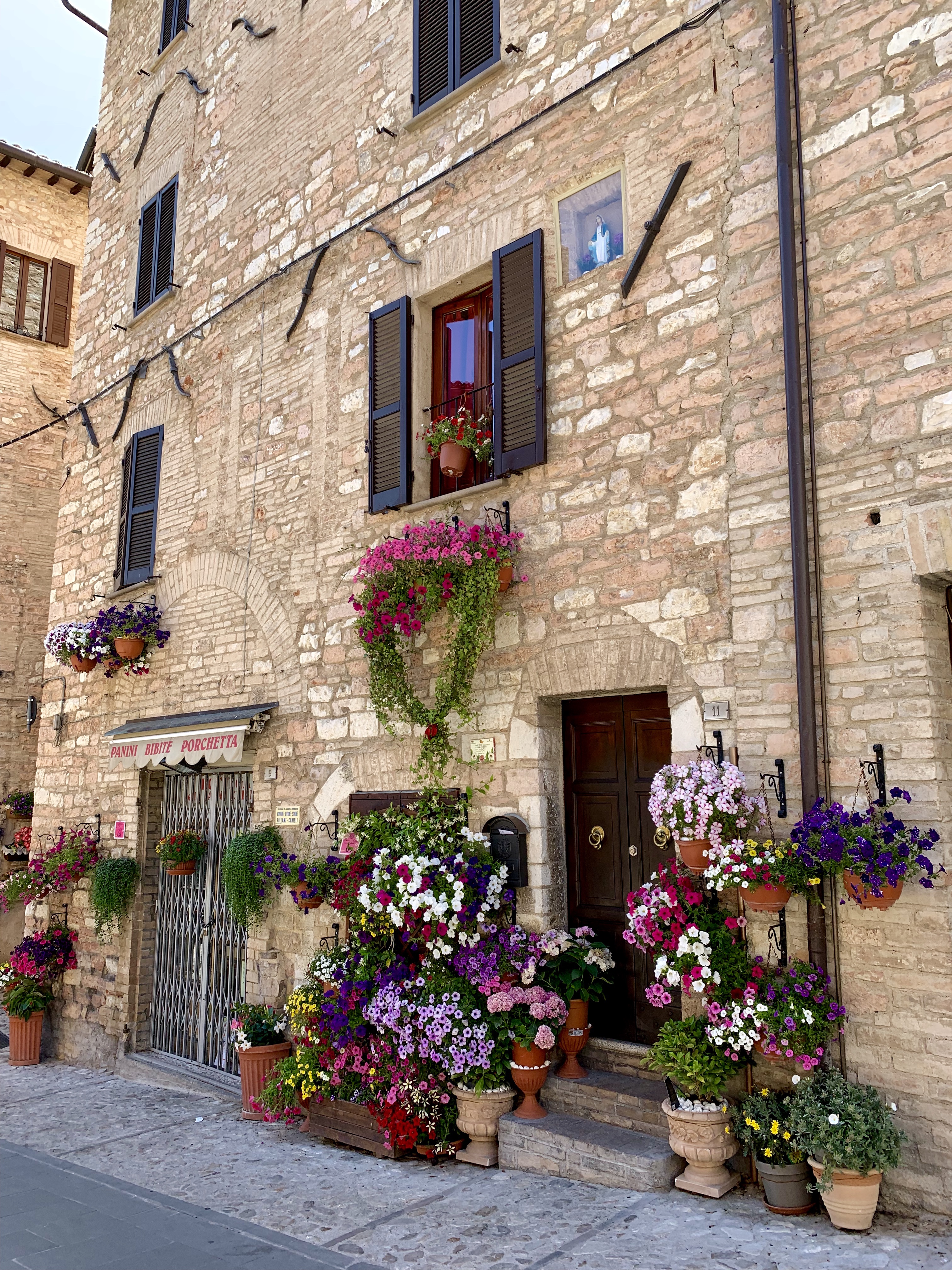 A festively decorated building near the town gate