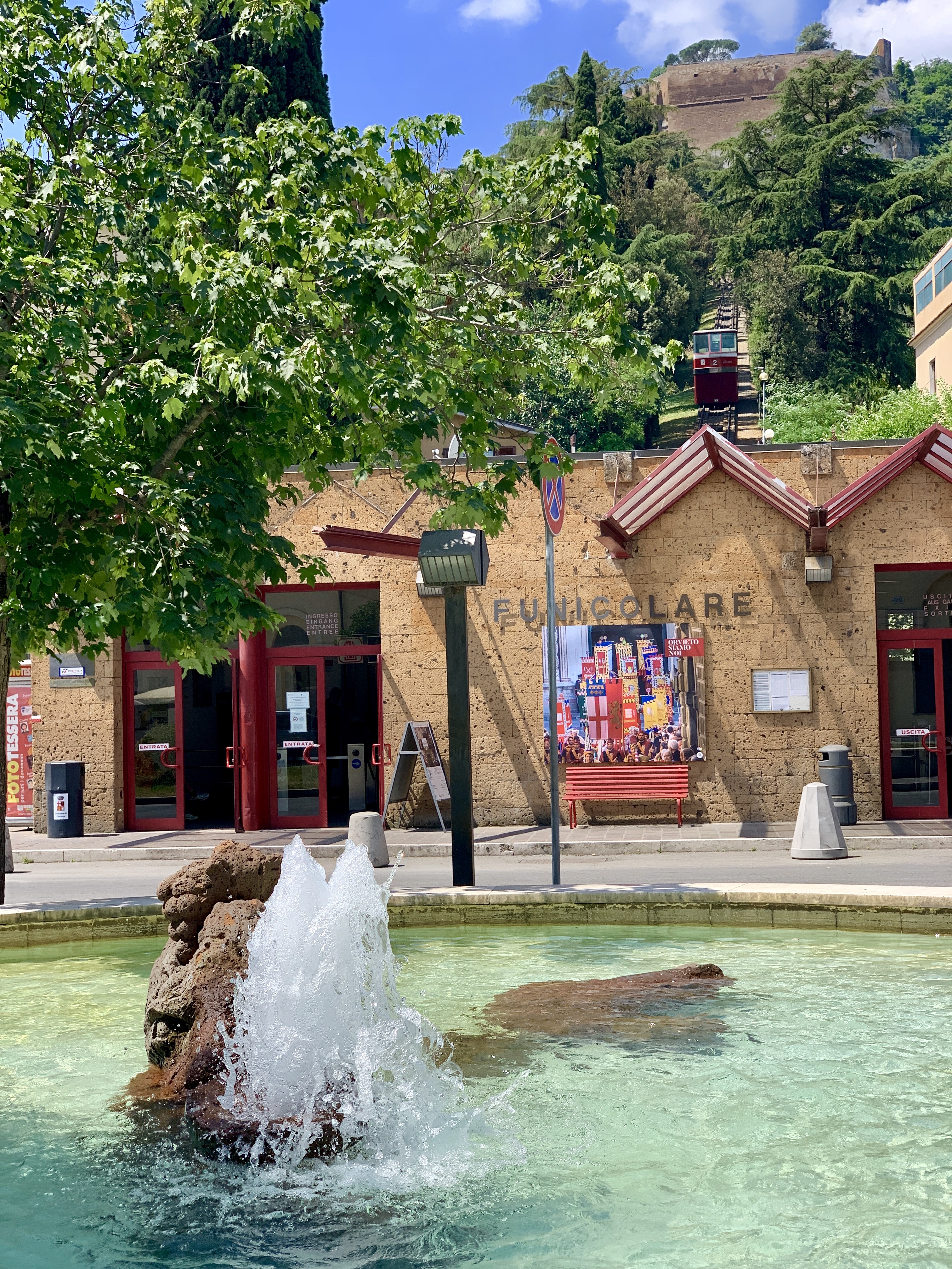 Looking up at the funicular from the bottom, with fountain in the foreground